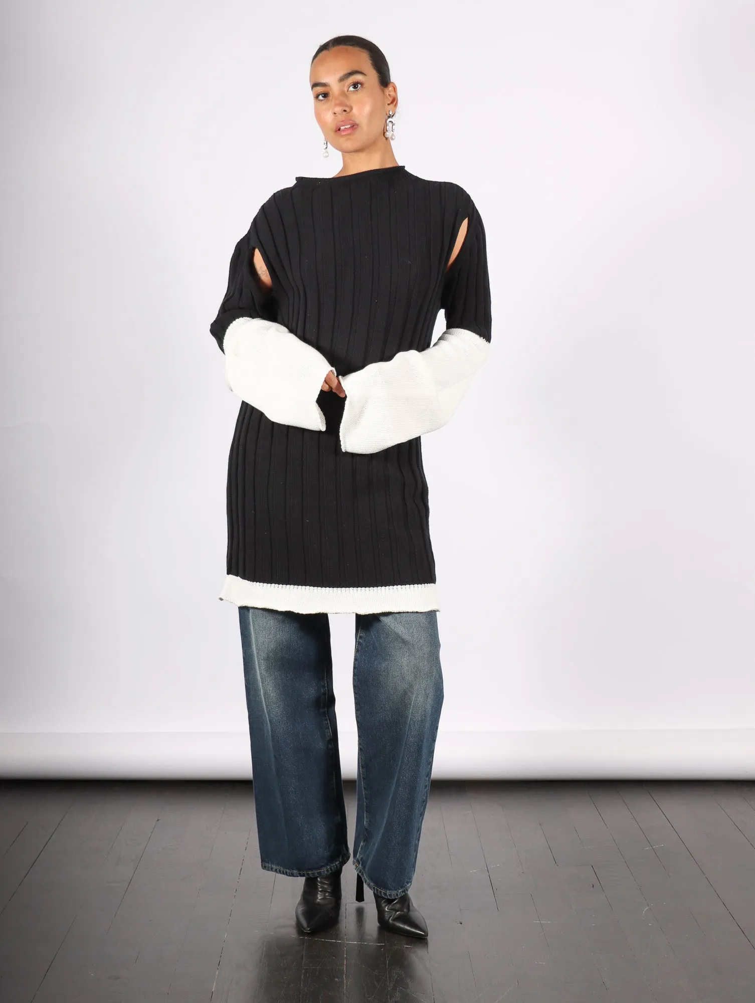 Behind The Scenes Sweater in Black by Issey Miyake