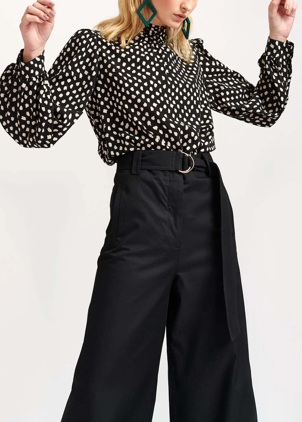 Black polka dot turtleneck top