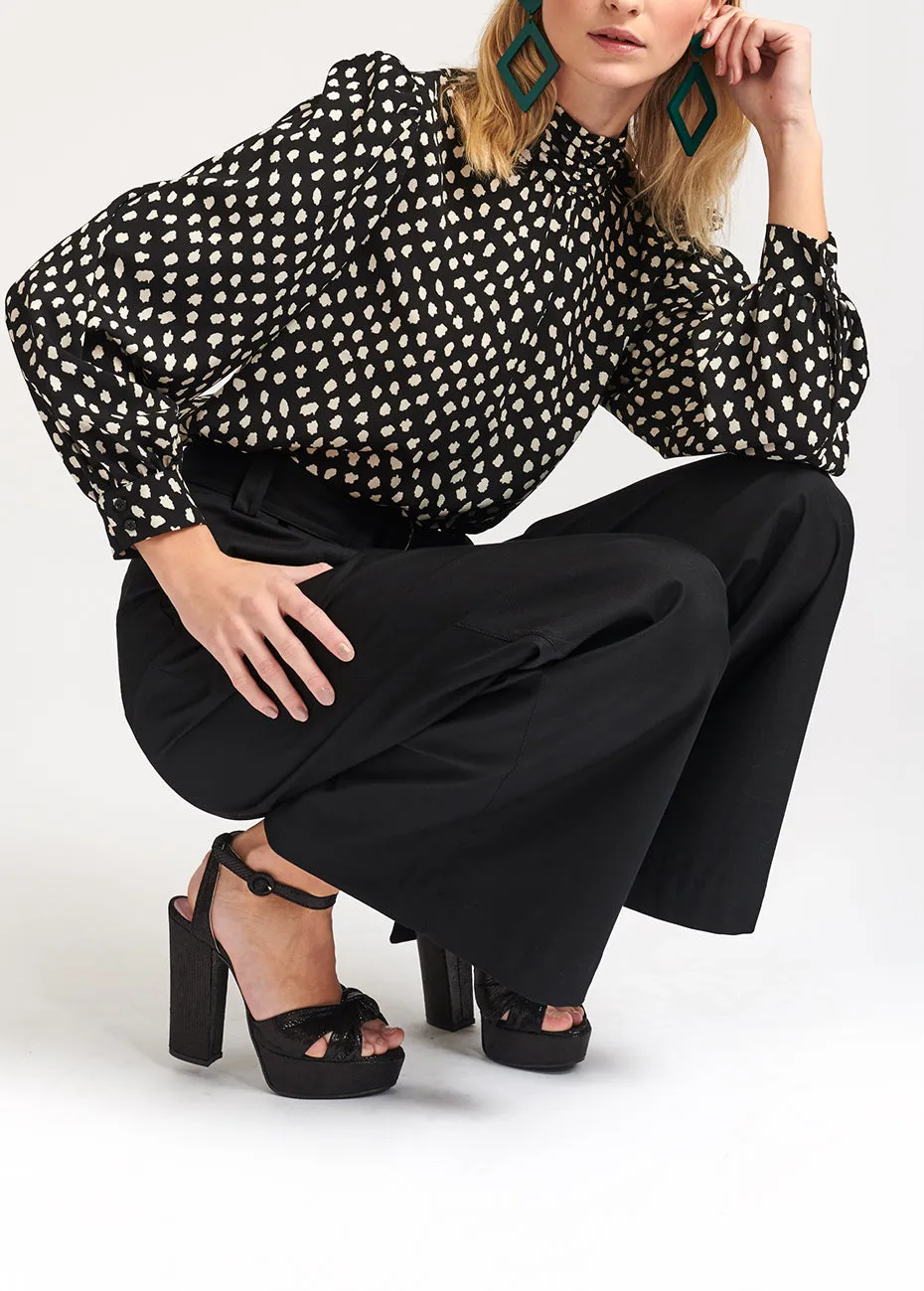 Black polka dot turtleneck top