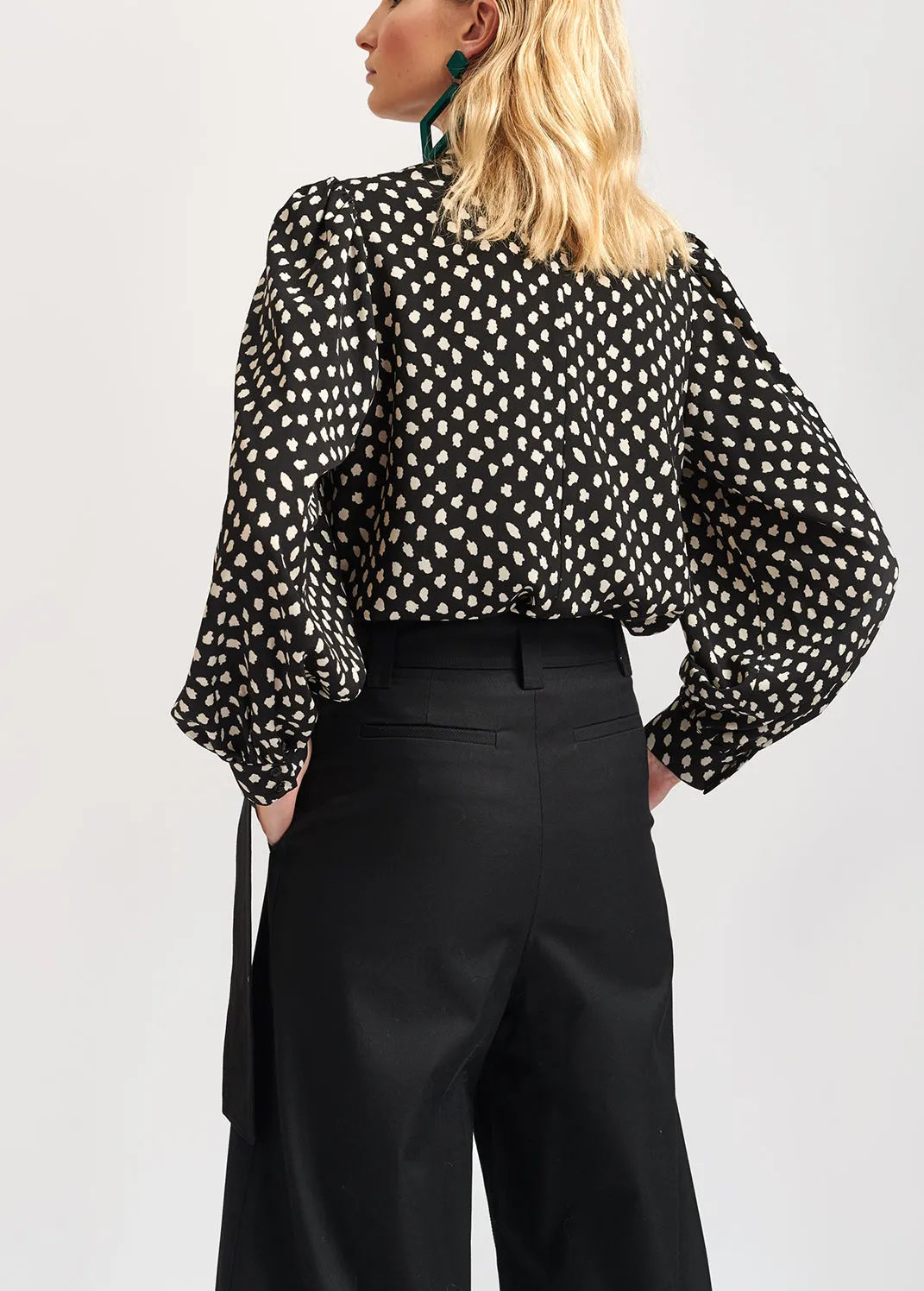 Black polka dot turtleneck top