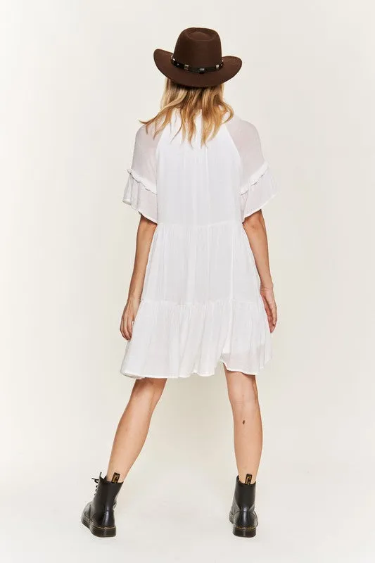 Ruffled neck tiered mini dress